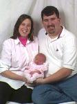 Emily Elizabeth and her mommy and daddy.